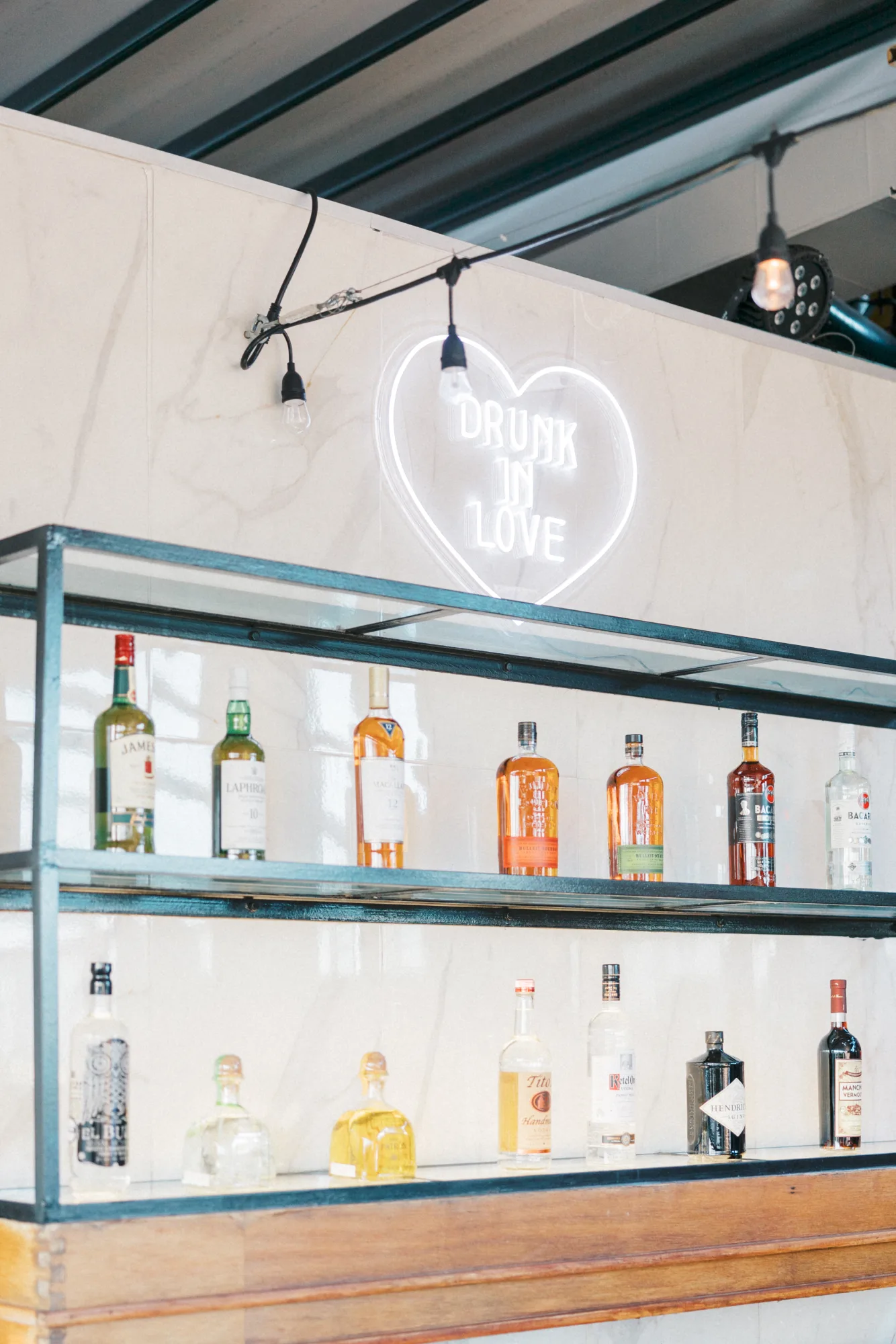 Wrap-around marble bar with neon sign