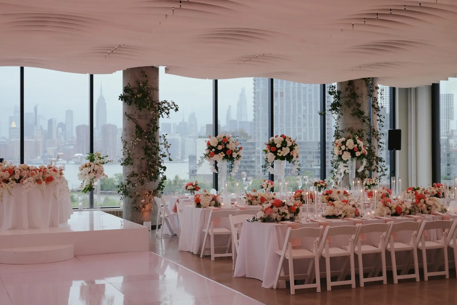 VESPER venue at night with the Manhattan skyline
